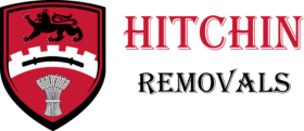 Coat of arms of Hitchin featuring a black lion at the top and a sheaf of wheat at the bottom on a red background, with the text 'HITCHIN' next to it.